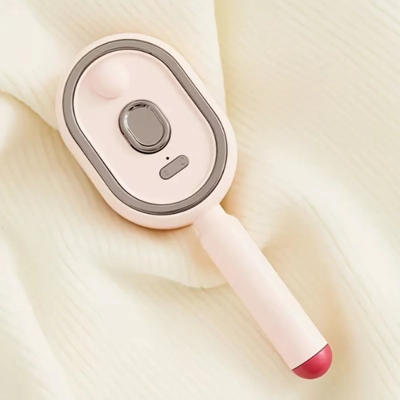 Elora heating massage hair brush in Pink